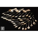 A parcel lot of assorted hallmarked tea spoons to include two sets of six,