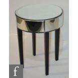 Amended description - A contemporary mirrored circular occasional table in the Deco style,
