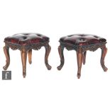 A pair of Victorian rosewood foot stools of square form, with acanthus carved cabriole legs,