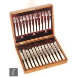 A Victorian cased set of 24 silver plated knives and forks with mother of pearl handles,