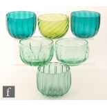 A 19th Century glass finger bowl of wrythen fluted form in green, height 8cm,