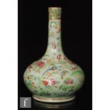 A Chinese famille rose celadon ground bottle vase, late Qing Dynasty (1644-1912), the globular body,