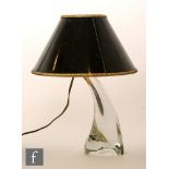 A mid 20th Century Daum table lamp, clear glass base of fluted triangular form,