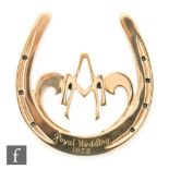 A cased 9ct hallmarked Royal Wedding Commemorative horseshoe, weight 173g, with certificate,