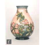 A Moorcroft Pottery vase decorated in the Sweet Briar pattern designed by Rachel Bishop,