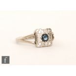 An 18ct white gold sapphire and diamond ring,