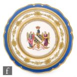 An early 19th Century Chamberlain Worcester plate enamelled decorated to the centre with the