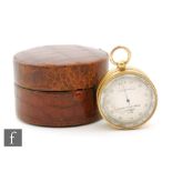 A Negretti and Zambra pocket barometer No 10772 in brass barrel form,