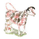 A 19th Century Staffordshire creamware cow creamer and cover with seated milkmaid and pail beneath,