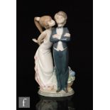 A Lladro figure 'Let's Make Up', model 5555, printed mark, height 21cm.