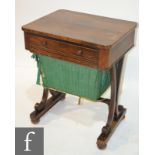 A 19th Century rosewood work table fitted with a single drawer above a bag slide on splayed scroll