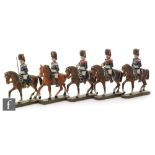 A set of six Lineol or Elastolin painted Hussars on horseback, one lacking rider,
