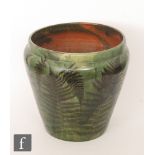 A large Ewenny Pottery jardiniere decorated with impressed fern leaves in brown,