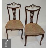 A set of four Edwardian drawing room chairs and two similar matching chairs (6)