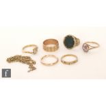 Seven assorted rings to include 18ct and 9ct carat stone set and wedding rings, with a 9ct chain,