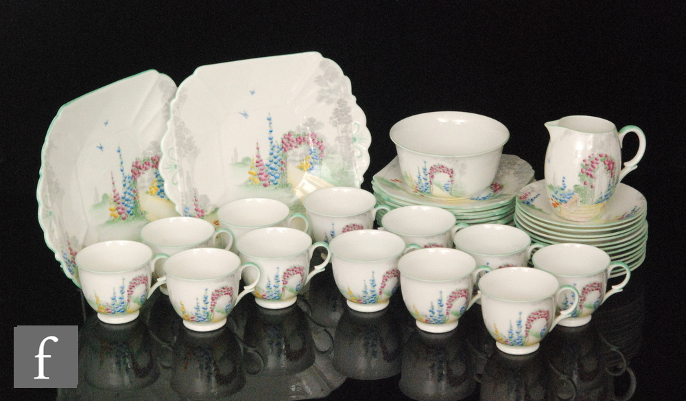 A 1930s Shelley Lomond shape part teaset decorated in the Archway of Roses and My Garden patterns,