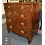 A George III mahogany straight front chest of two short and three long drawers,