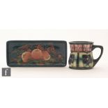 A Moorcroft Pottery rectangular pen tray decorated in the Finches pattern designed by Sally Tuffin,