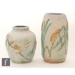 A 1930s/1940s Bourne Denby Danesby ware cylindrical vase decorated in pastel blues and green with