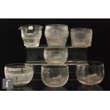 A group of seven clear glass finger bowls and rinsers,
