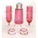 A ruby glass sugar shaker with silver plated top,