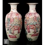 A pair of late 19th to early 20th Century Chinese export famille rose vases,