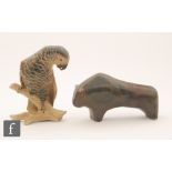 A Bing & Grondahl stoneware model of a parrot perched on a branch, the whole glazed in tonal brown,