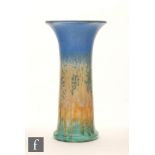 Ruskin Pottery - A crystalline glaze lily vase of flared cylindrical form decorated in a mottled