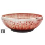 Ruskin Pottery - A high fired high sided bowl decorated in a sang de boeuf glaze,