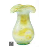 Loetz - A large early 20th Century vase of compressed ovoid form with dimple sides rising to a