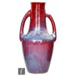 Ruskin Pottery - A large twin handled high fired vase decorated with an all over flambe and tonal