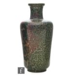Ruskin Pottery - A high fired vase of shouldered form with a flared neck decorated in an all over