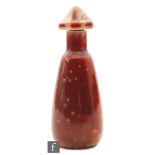 Ruskin Pottery - A small high fired pagoda topped scent bottle of tapering cylindrical form