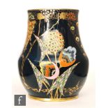 Carlton Ware - A 1930s Art Deco vase decorated in the Devil's Copse pattern with stylised gilt and