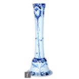 William Moorcroft - James Macintyre & Co - An early 20th Century Florian Ware candlestick with bell