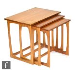 G Plan - A nest of three post war tea side tables with rectangular tops and open side supports.