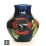 William Moorcroft - A vase of shouldered ovoid form in the Pansy pattern,