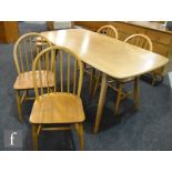 Ercol - Four blonde elm and beech 'Windsor' hoop back dining chairs, model 370,