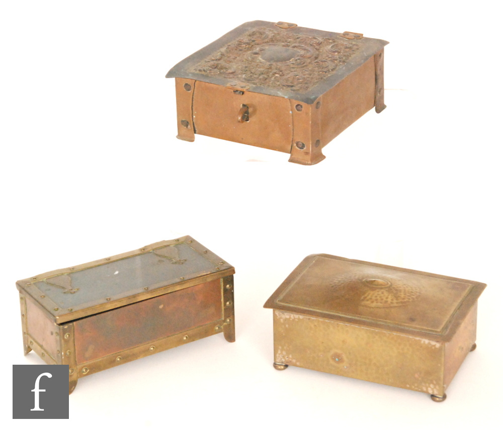 Unknown - Three assorted brass and copper rectangular boxes to include strap work and foliate