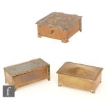 Unknown - Three assorted brass and copper rectangular boxes to include strap work and foliate