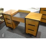 John and Sylvia Reid - Stag Furniture - A 'C' Range desk or dressing table of well top design,