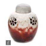 Ruskin Pottery - A small high fired pot pourri and domed cover decorated in a sang de boeuf glaze