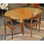 G-Plan Furniture - A model 4395 teak dining table of circular form,