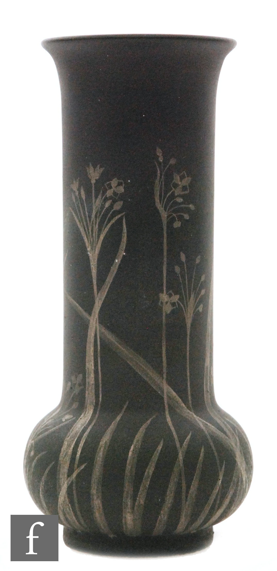 Ruskin Pottery - A small vase of compressed form with a cylinder neck,