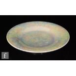 Ruskin Pottery - A lavender lustre shallow footed dish decorated in a mottled glaze, impressed mark,