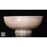 Ruskin Pottery - An early 20th Century egg shell bowl of footed circular form,