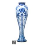 William Moorcroft - William Moorcroft - James Macintyre & Co - A Florian Ware vase of tapering form