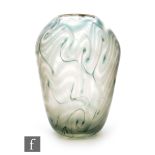 Louis Comfort Tiffany - A early 20th Century glass vase of ovoid form surface decorated with a