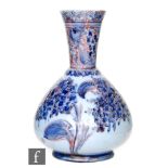 William Moorcroft - James Macintyre & Co - An early 20th Century Florian Ware vase of globe and