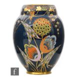 Carlton Ware - A 1930s Art Deco vase of swollen form with an indented collar neck decorated in the